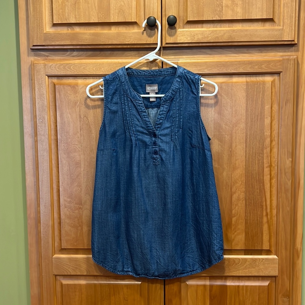 Chico’s denim pleated button down top.  Size 0
